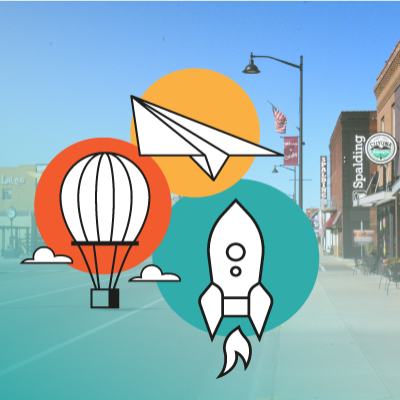Mainstreet Background with Airplane, Hot Air balloon, and Rocket Icons
