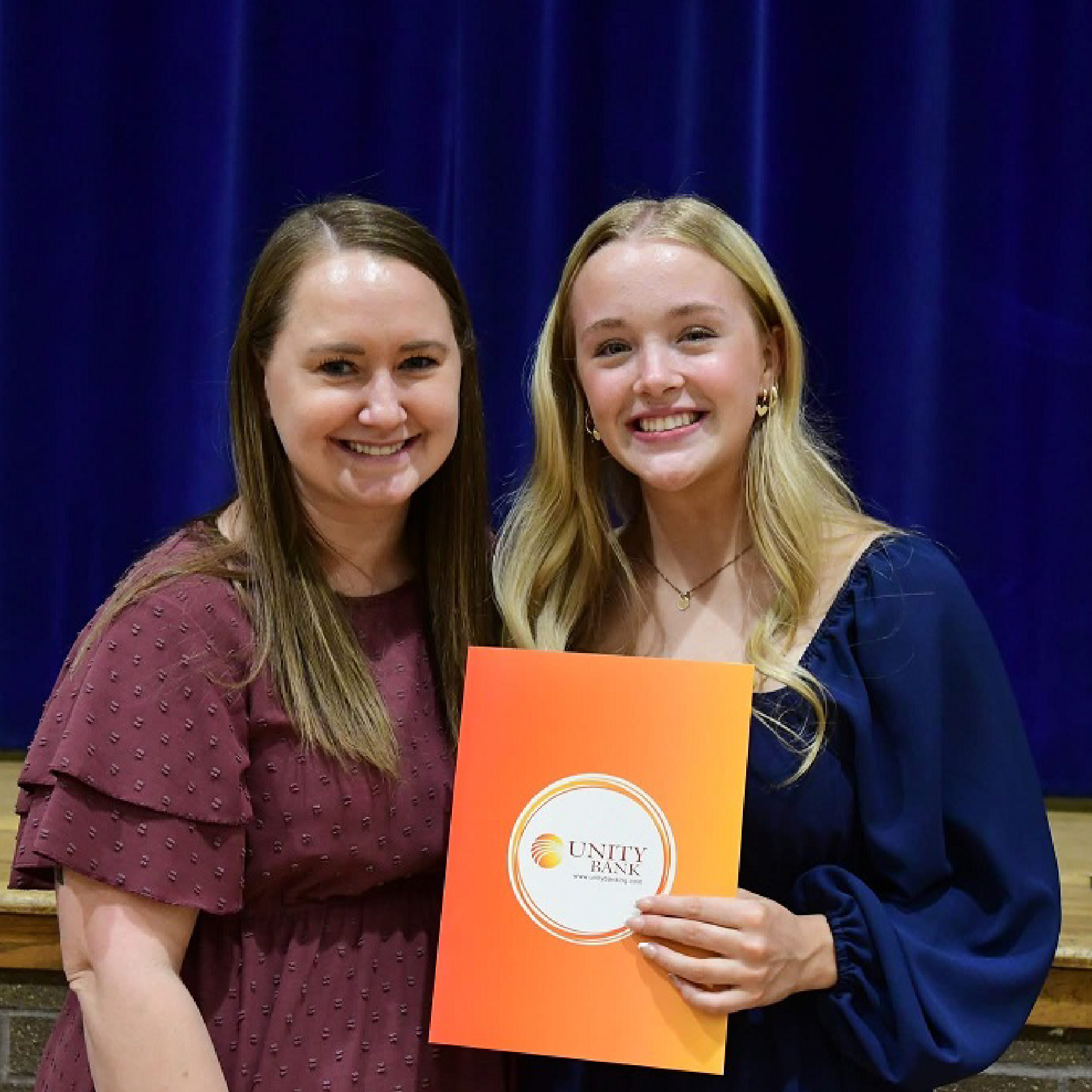 Amy Presenting Ella with Scholarship