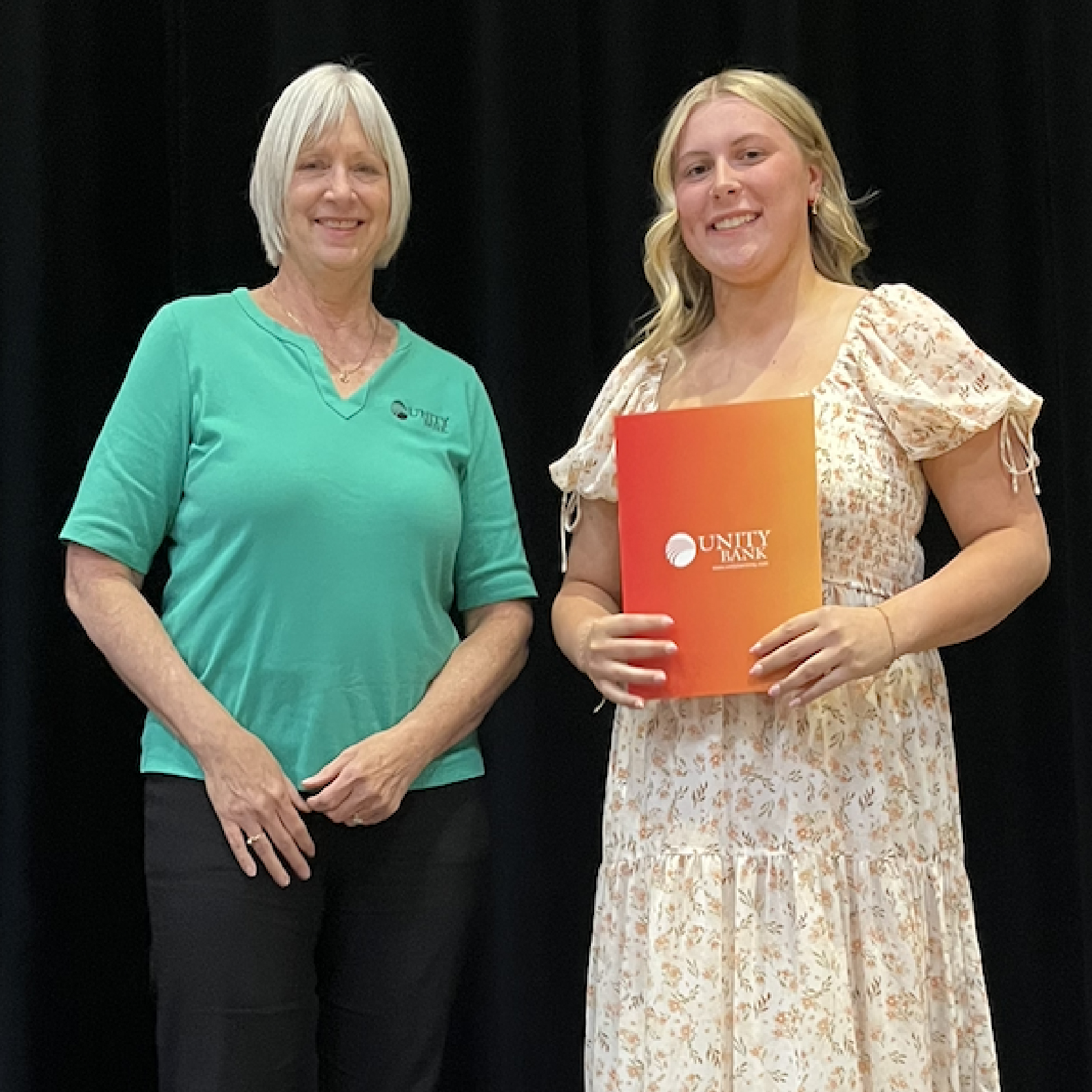 Kim Presenting Ericka with Scholarship