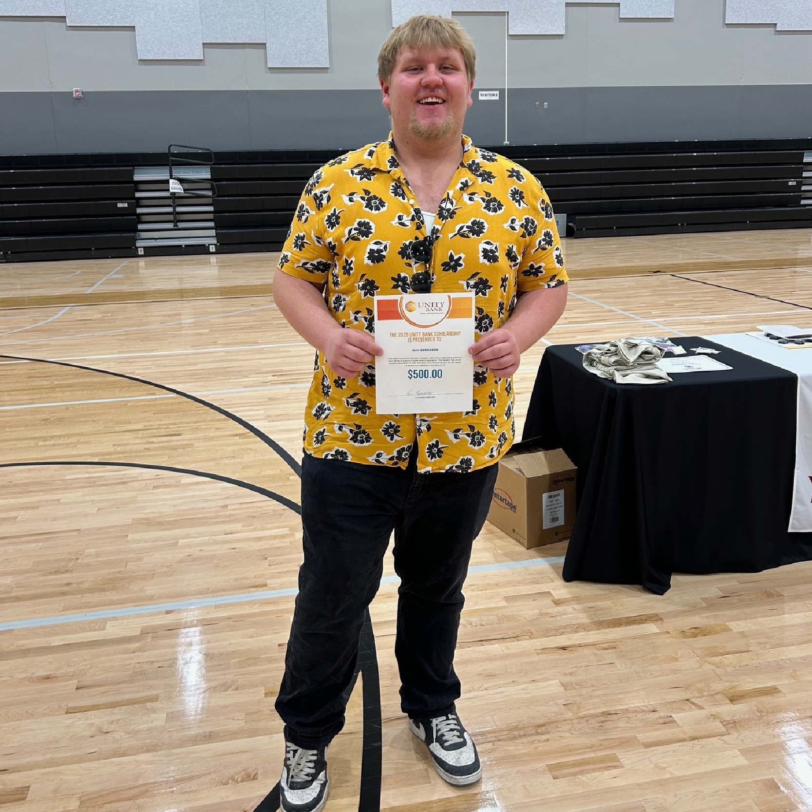Guy Bergeson with Scholarship Certificate