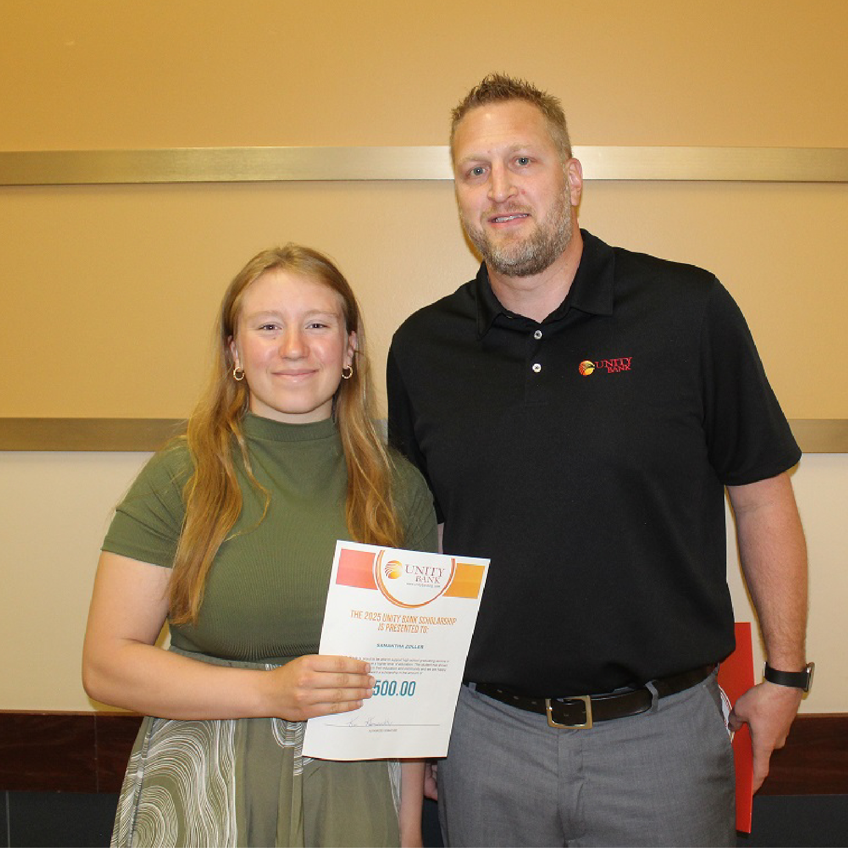 Tyler Presenting Samantha with Scholarship